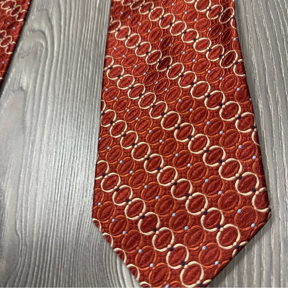 Jos. A. Bank Rust Orange Silk Tie Italy Made Yellow Geometric Circle Pattern 59”